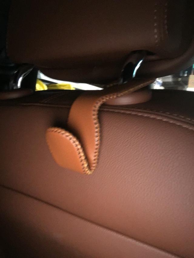 Car hook installed on headrest