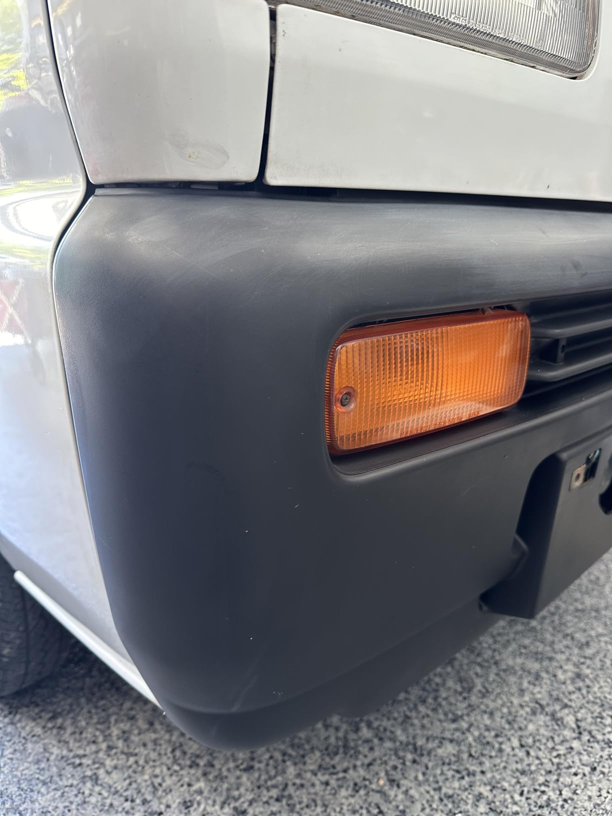 CAR GUYS Plastic Restorer on mini truck bumper before