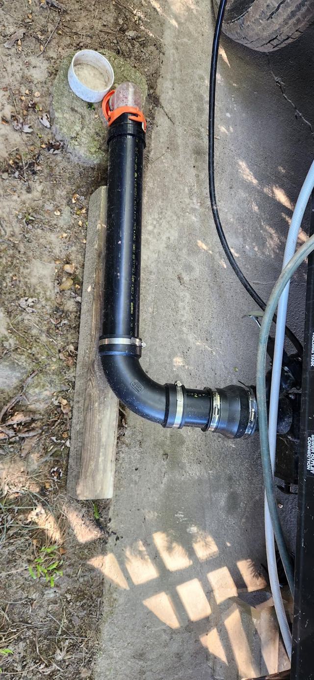 Clear view of RV sewer hose elbow